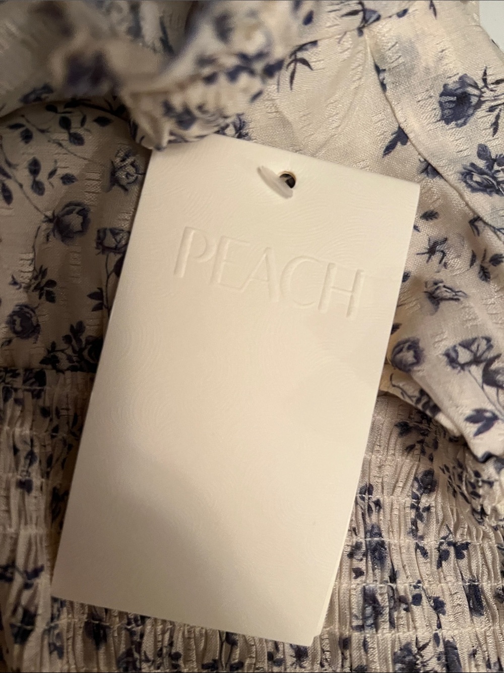Smocked Peplum Floral Top in White and Blue - Picture 6 of 8